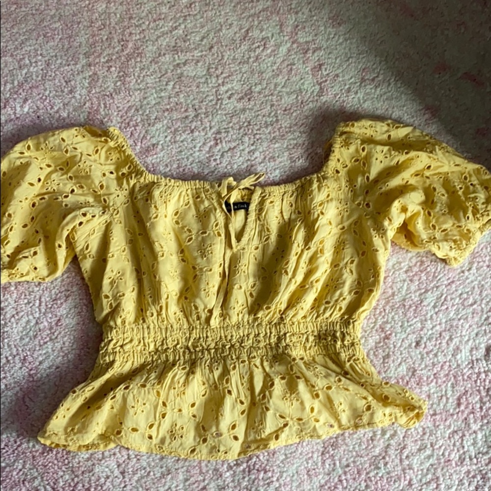 Off the shoulder yellow crop top.